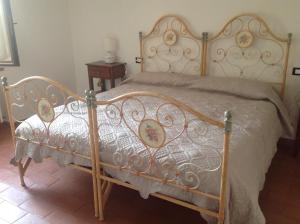 A bed or beds in a room at Teruzzi Country House