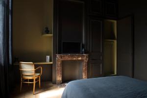 Postel nebo postele na pokoji v ubytování Les Toquées Maison d'hôtes