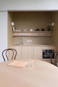 Kuchyň nebo kuchyňský kout v ubytování Les Toquées Maison d'hôtes