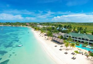 an aerial view of the beach at the excellence punta cana resort at Sandals Negril Beach All Inclusive Resort and Spa - Couples Only in Negril