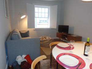 TV a/nebo společenská místnost v ubytování Ribeira Apartment