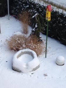 a toilet bowl in the snow with a bird house at Schuster Emma in Valdaora