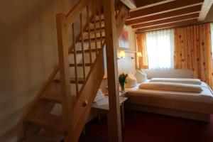 Ένα ή περισσότερα κρεβάτια σε δωμάτιο στο Hotel Gasthof Neuner
