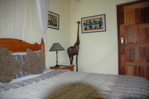 Letto o letti in una camera di Trees Too Guest Lodge