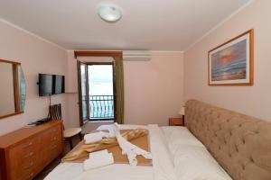 Postel nebo postele na pokoji v ubytování Hotel Anderba
