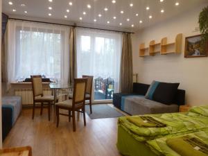 Posedenie v ubytovaní Apartamenty u Łukasza