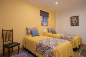 Postel nebo postele na pokoji v ubytování Casa do Cristelo
