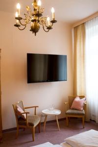 TV o dispositivi per l'intrattenimento presso AMSEL VINTAGE Rooms