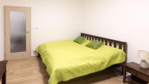 Posteľ alebo postele v izbe v ubytovaní Apartment Aloha