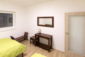 Posteľ alebo postele v izbe v ubytovaní Apartment Aloha