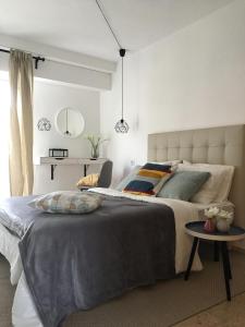 Posteľ alebo postele v izbe v ubytovaní Apartment Albufereta beach