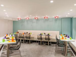 ห้องอาหารหรือที่รับประทานอาหารของ ibis Styles Paris Boulogne Marcel Sembat