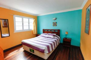 Rúm í herbergi á Casa Violeta Limón