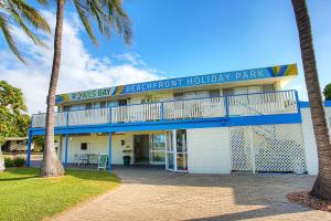 a large blue and white building with a blue sky at BIG4 Tasman Holiday Parks - Rowes Bay in Townsville