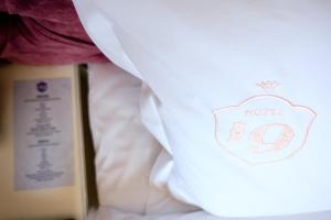 Postel nebo postele na pokoji v ubytování Hotel 19
