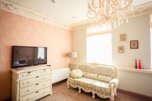 TV a/nebo společenská místnost v ubytování Hotel 19