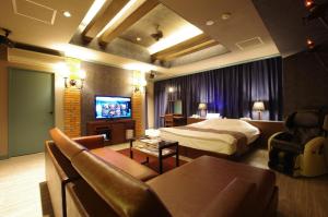 Μια τηλεόραση ή/και κέντρο ψυχαγωγίας στο BlueHotel sju(:)pri:m (Adult Only)