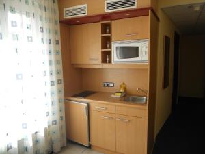 Kuchyň nebo kuchyňský kout v ubytování Apartments Aschheim