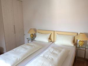 Postel nebo postele na pokoji v ubytování Hotel Spiegel Garni