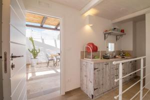 A cozinha ou cozinha compacta de Casa Martina