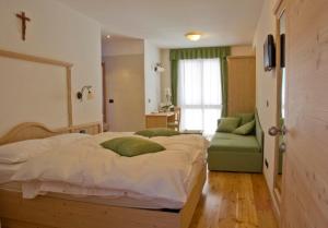 Postel nebo postele na pokoji v ubytování Agritur Golden Pause