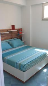 A bed or beds in a room at Residenza del Mare & SPA