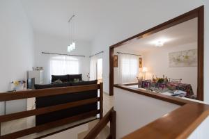 TV a/nebo společenská místnost v ubytování Casa Angel A3