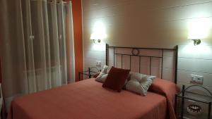 Ένα ή περισσότερα κρεβάτια σε δωμάτιο στο El Cordel de Gredos