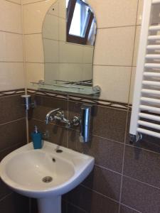 Koupelna v ubytování Guesthouse Gia