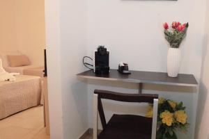Postel nebo postele na pokoji v ubytování La Corte Di Ibla