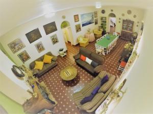 an aerial view of a living room with a table at Huerta La Cansina in Mairena del Alcor