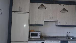 Kuchnia lub aneks kuchenny w obiekcie PLAZA DE LA VILLA 24