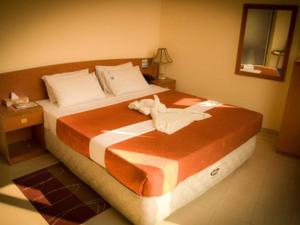 Llit o llits en una habitació de Praasad Paradise