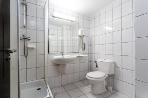 Ванна кімната в Complex Balnear Cozia