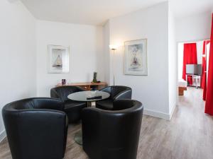 Posezení v ubytování DORMERO Hotel Dresden Airport