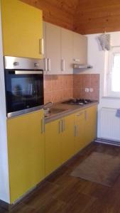 Kuchyň nebo kuchyňský kout v ubytování Holiday home Novak M