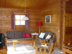 Posezení v ubytování Chalets du Soleil