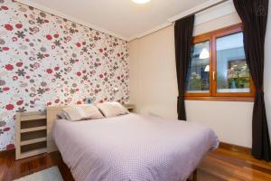Posteľ alebo postele v izbe v ubytovaní Apartamento Artekale