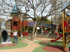 a park with a playground with a slide at Benal Beach in Málaga