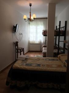 A bed or beds in a room at Os Arroxos Még 24 kép