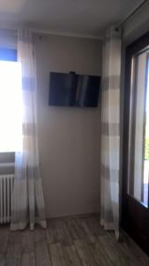 A television and/or entertainment centre at Villa Sofia