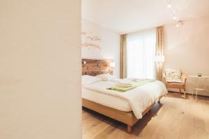 Ένα ή περισσότερα κρεβάτια σε δωμάτιο στο Weinwirtshaus Wlaschits +26 φωτογραφίες