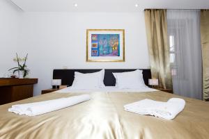 Postel nebo postele na pokoji v ubytování Hotel Marul