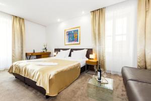 Postel nebo postele na pokoji v ubytování Hotel Marul