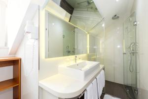 Koupelna v ubytování Hotel Marul