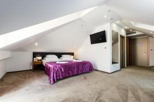 Postel nebo postele na pokoji v ubytování Hotel Marul