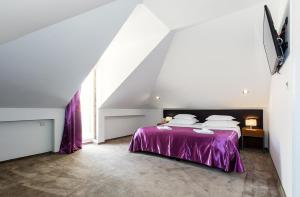 Postel nebo postele na pokoji v ubytování Hotel Marul