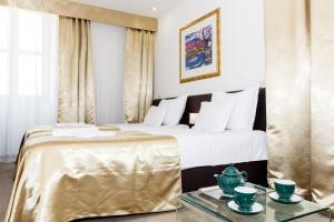 Postel nebo postele na pokoji v ubytování Hotel Marul