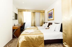 Postel nebo postele na pokoji v ubytování Hotel Marul