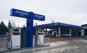 a gas station with two pumps in front of it at SEO Motel Alavieska in Alavieska